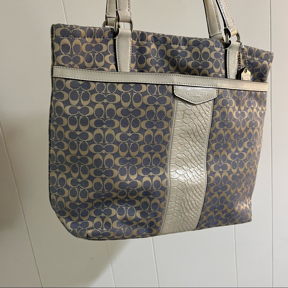 Blue, beige, and cream Coach classic print handbag